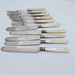 Vintage mother of pearl silverware set with silver-plated knives and forks