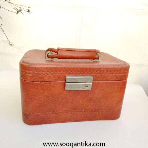 Very old faux leather jewelry bag in very good condition
